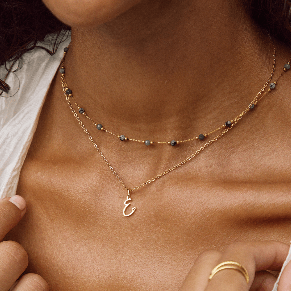 Gold Letter Heart Necklace on model – Noor & Rose